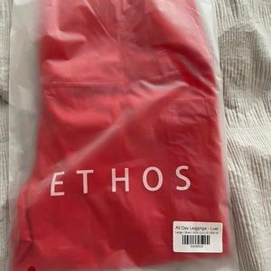 Ethos leggings. Red, short in length, size large. Pockets on sides. Never worn